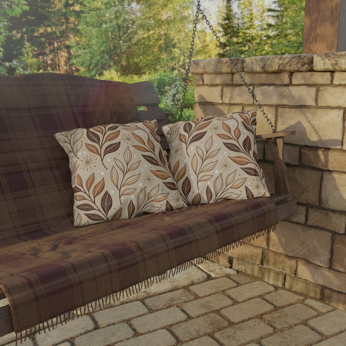 Brown leaf sprig outdoor pillow — spun polyester, UV and water resistant