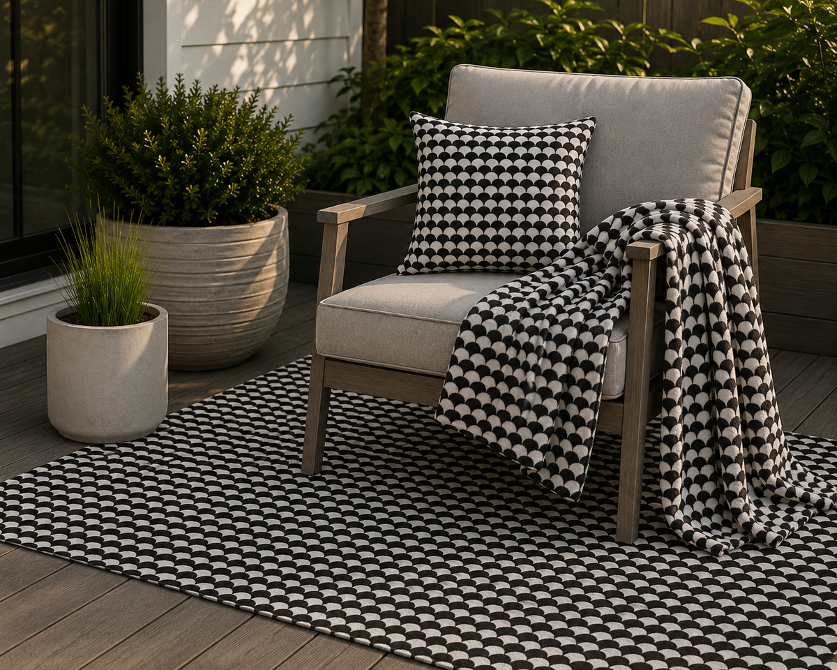 Black and white scallop outdoor pillow — spun polyester, UV and water resistant