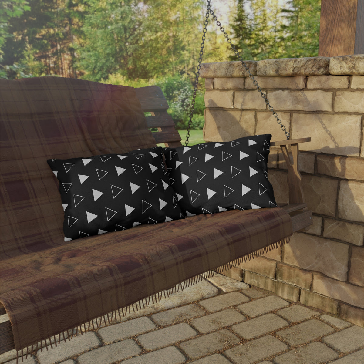Black arrow lumbar outdoor pillow — spun polyester, UV and water resistant