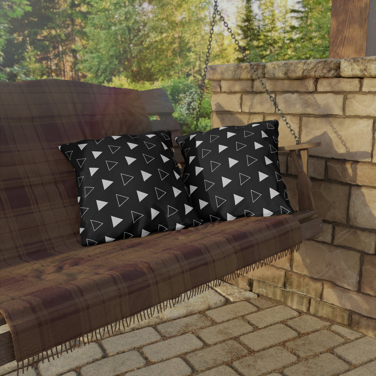 Black arrow outdoor pillow — spun polyester, UV and water resistant