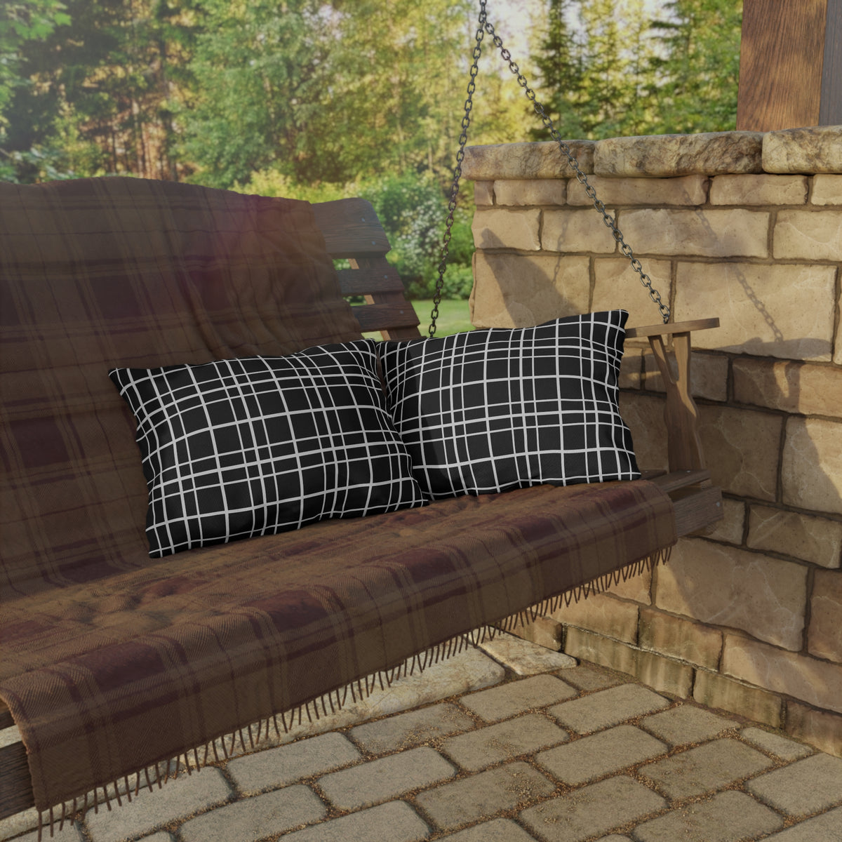 Black windowpane grid lumbar outdoor pillow — spun polyester, UV and water resistant
