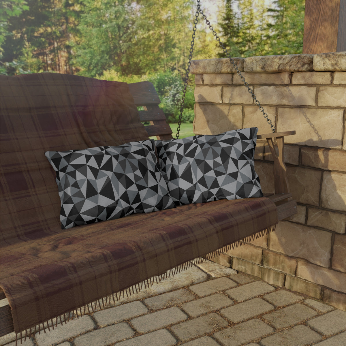 Charcoal facet lumbar outdoor pillow — spun polyester, UV and water resistant