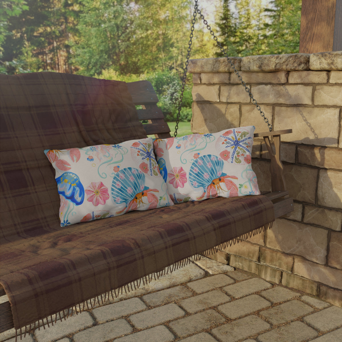 Coastal seashell lumbar outdoor pillow — spun polyester, UV and water resistant