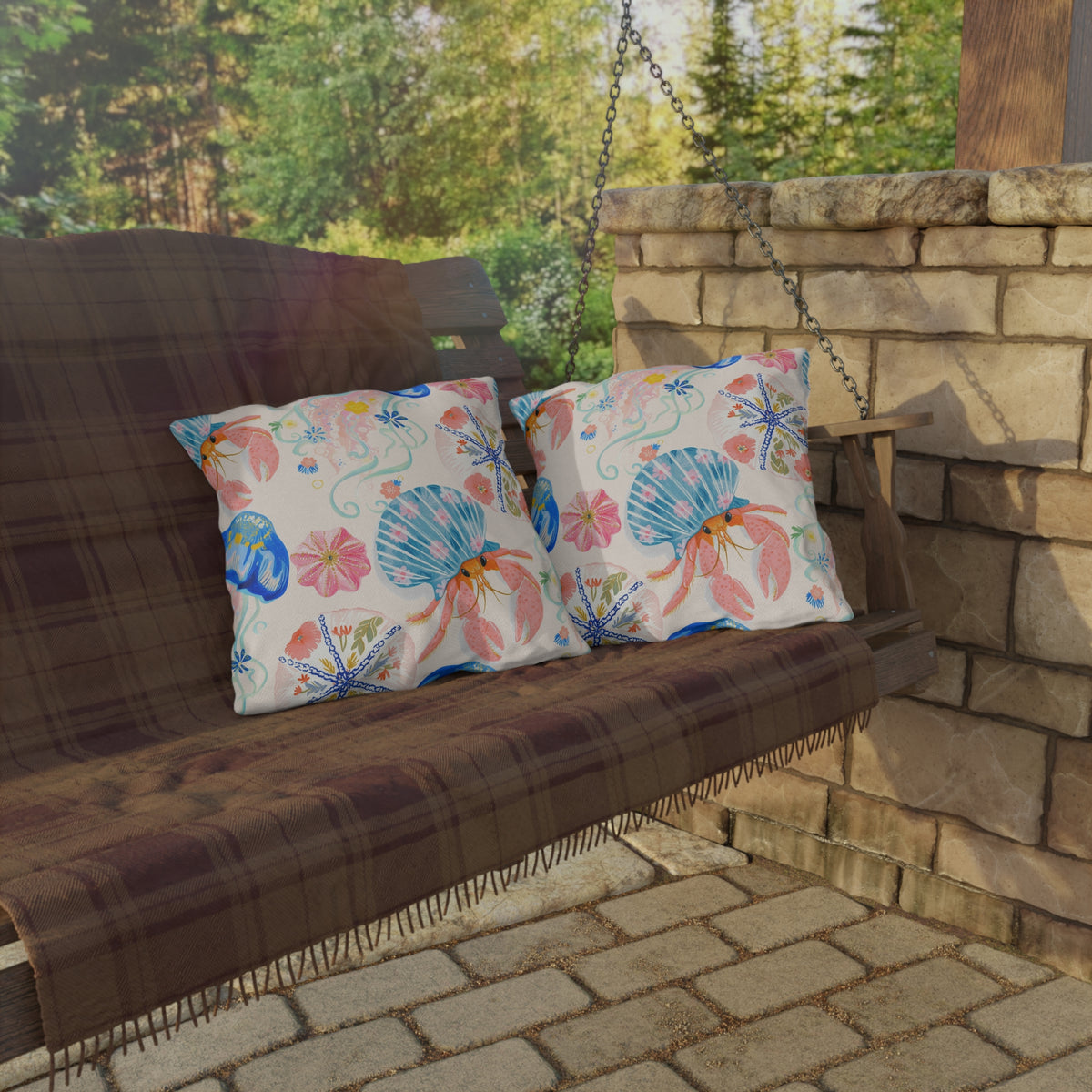 Coastal seashell outdoor pillow — spun polyester, UV and water resistant