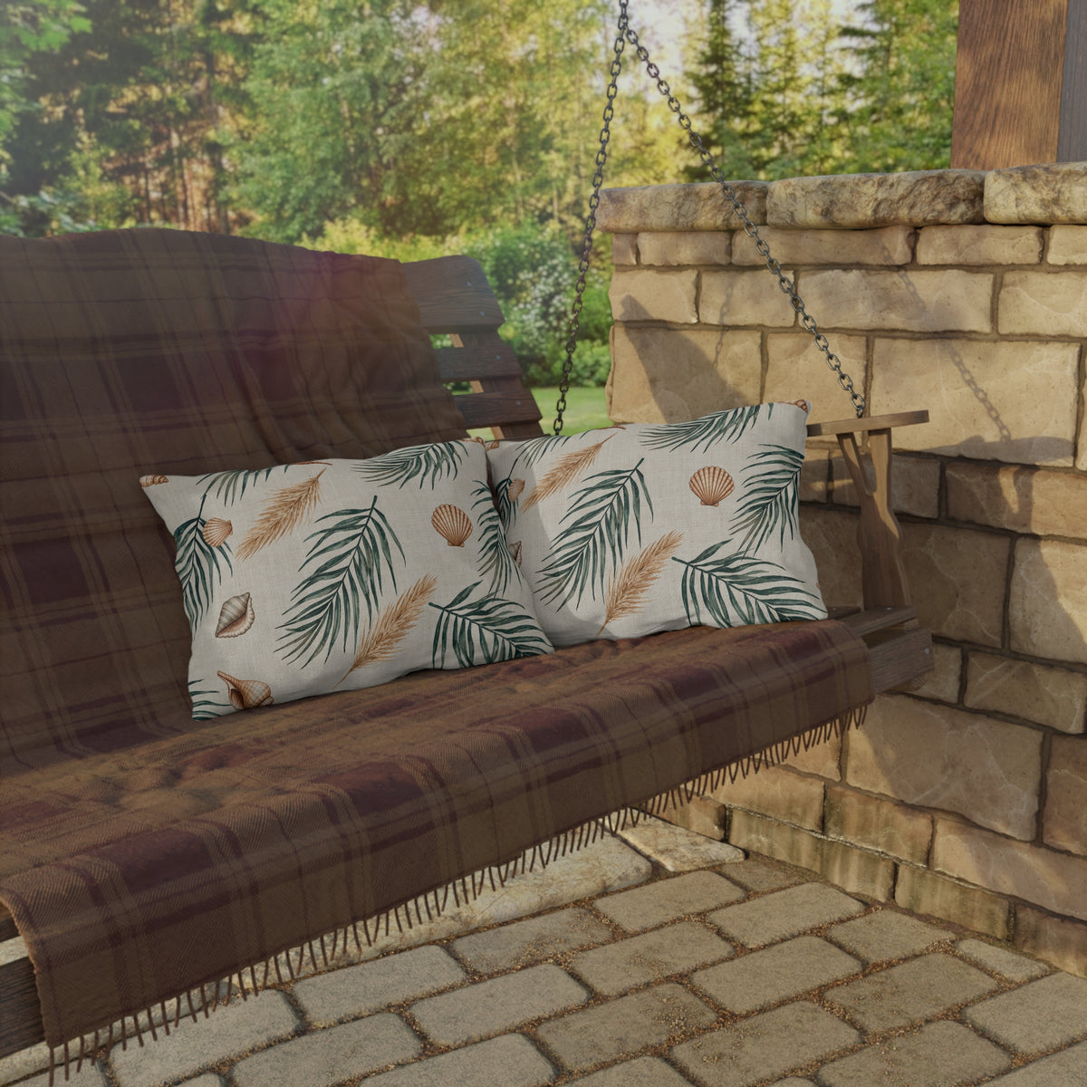 Green palm and shell lumbar outdoor pillow — spun polyester, UV and water resistant