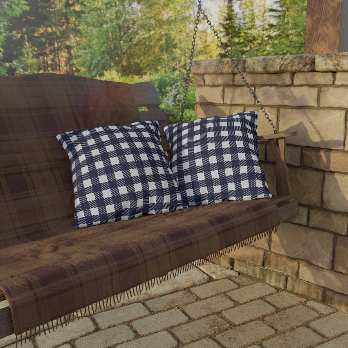 Navy and white buffalo check outdoor pillow — spun polyester, UV and water resistant