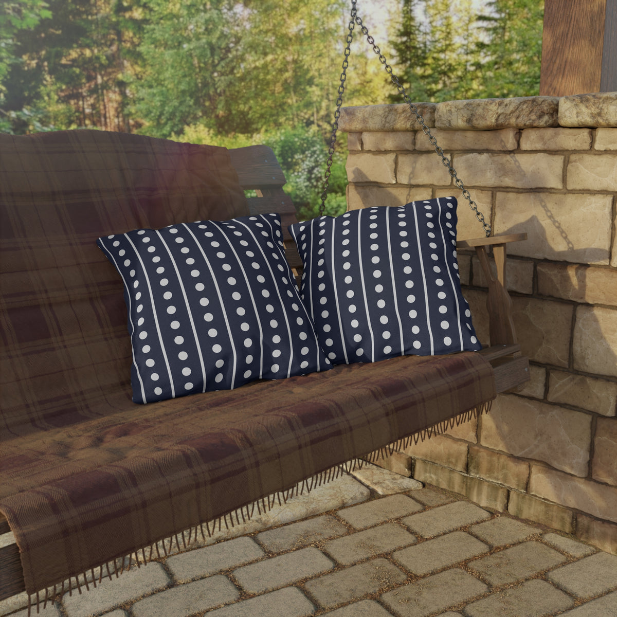 Navy and white dot stripe outdoor pillow — spun polyester, UV and water resistant