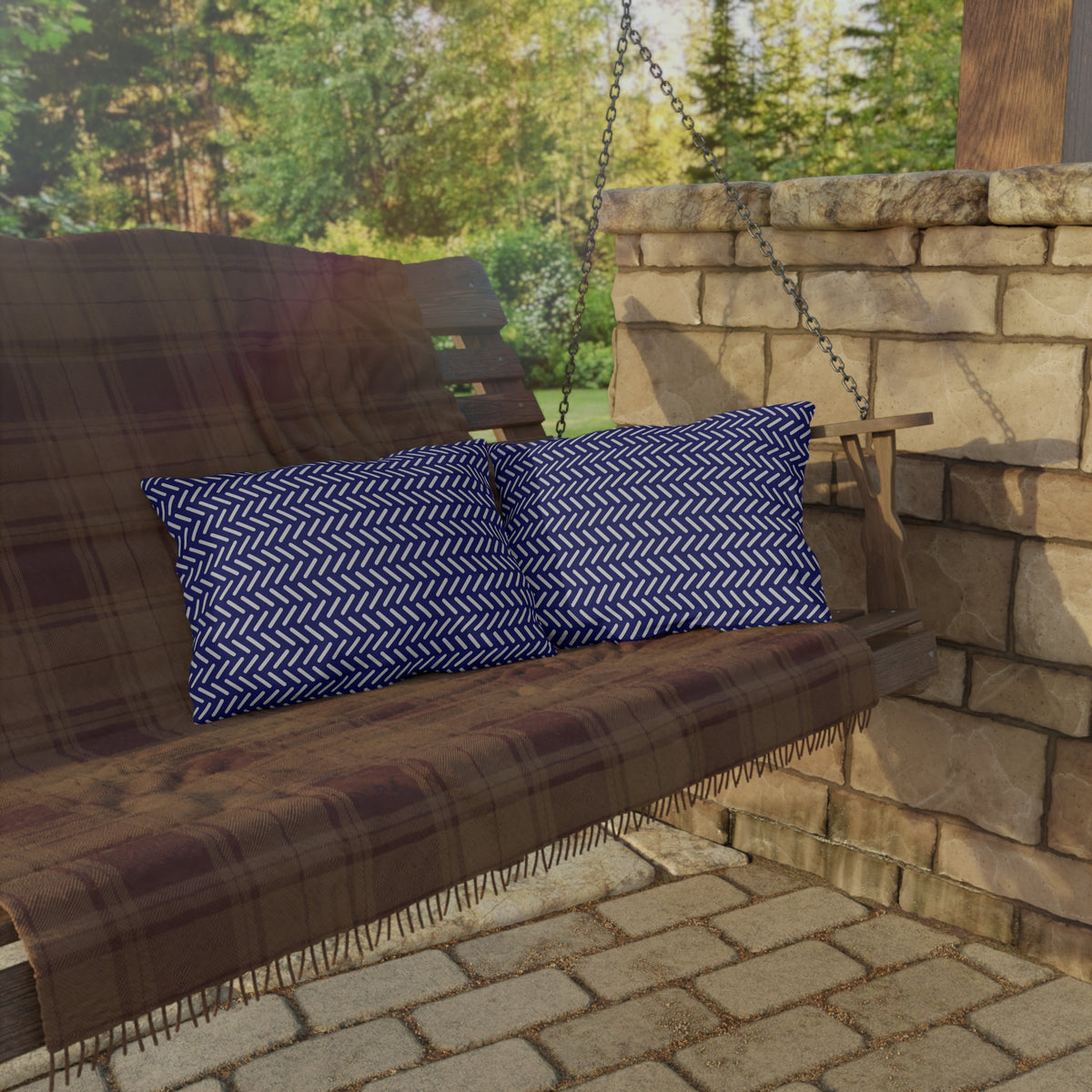 Navy and white herringbone lumbar outdoor pillow — spun polyester, UV and water resistant