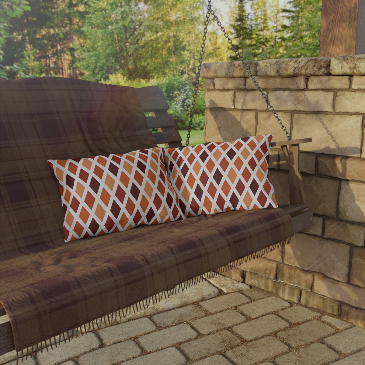 Rust harlequin diamond lumbar outdoor pillow — spun polyester, UV and water resistant