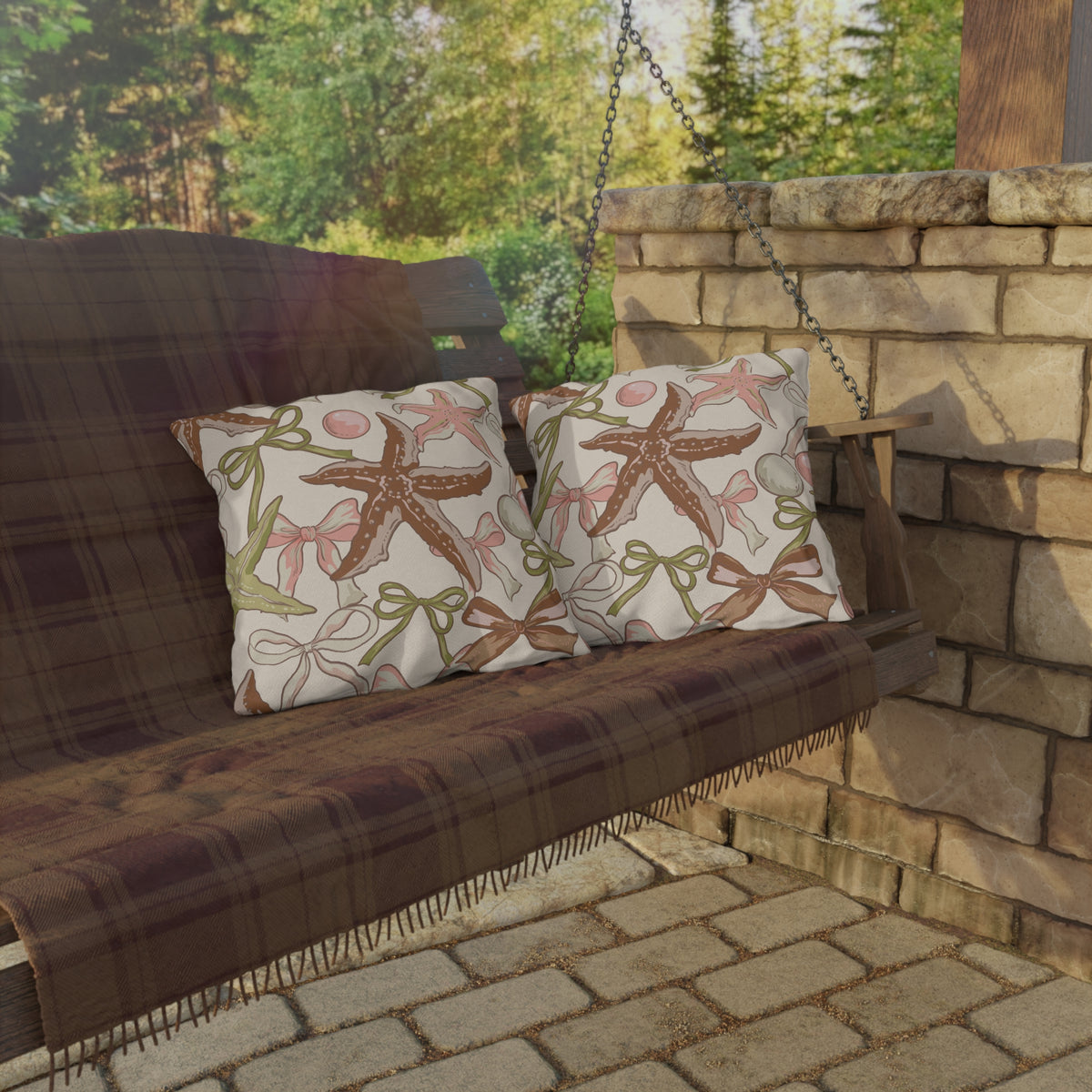 Sage starfish and bow outdoor pillow — spun polyester, UV and water resistant
