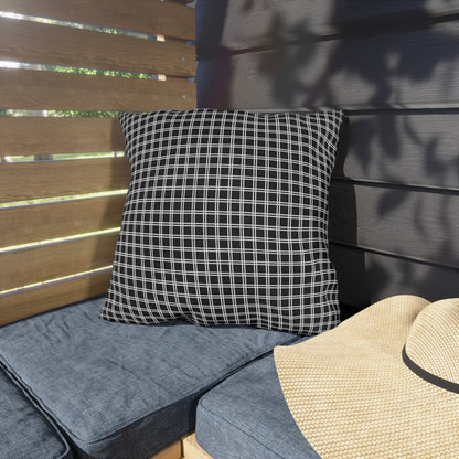 Black and white checkered outdoor pillow — spun polyester, UV and water resistant