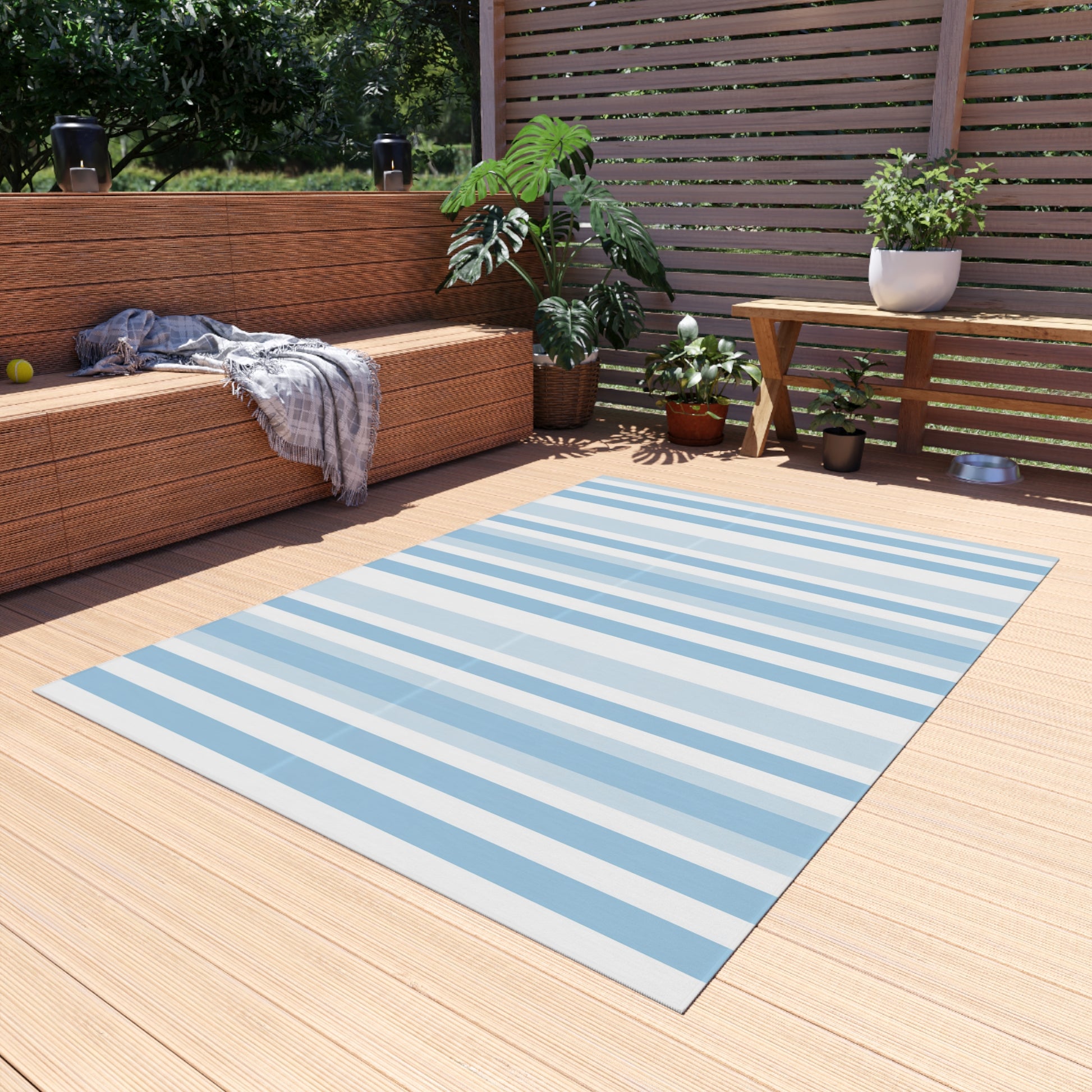 Blue and white striped outdoor rug — soft polyester chenille with a non-slip backing