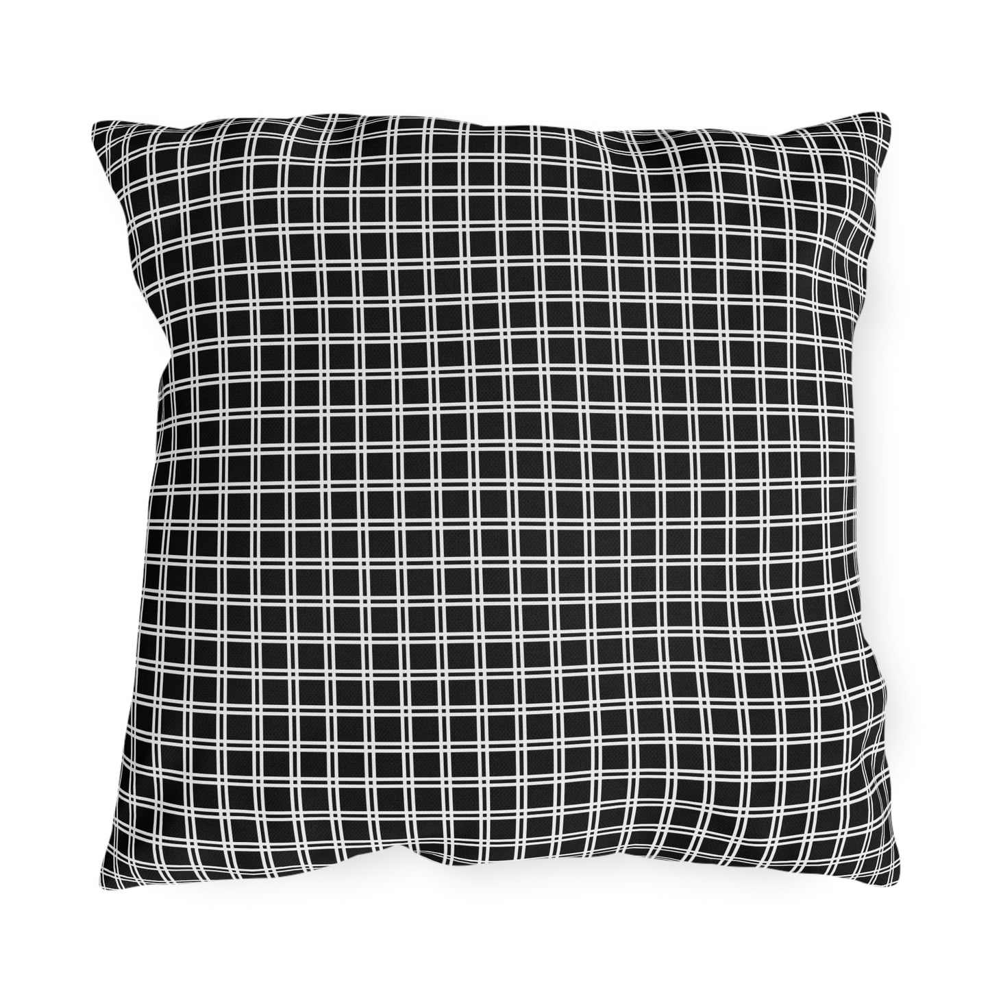 Black and white checkered outdoor pillow — spun polyester, UV and water resistant