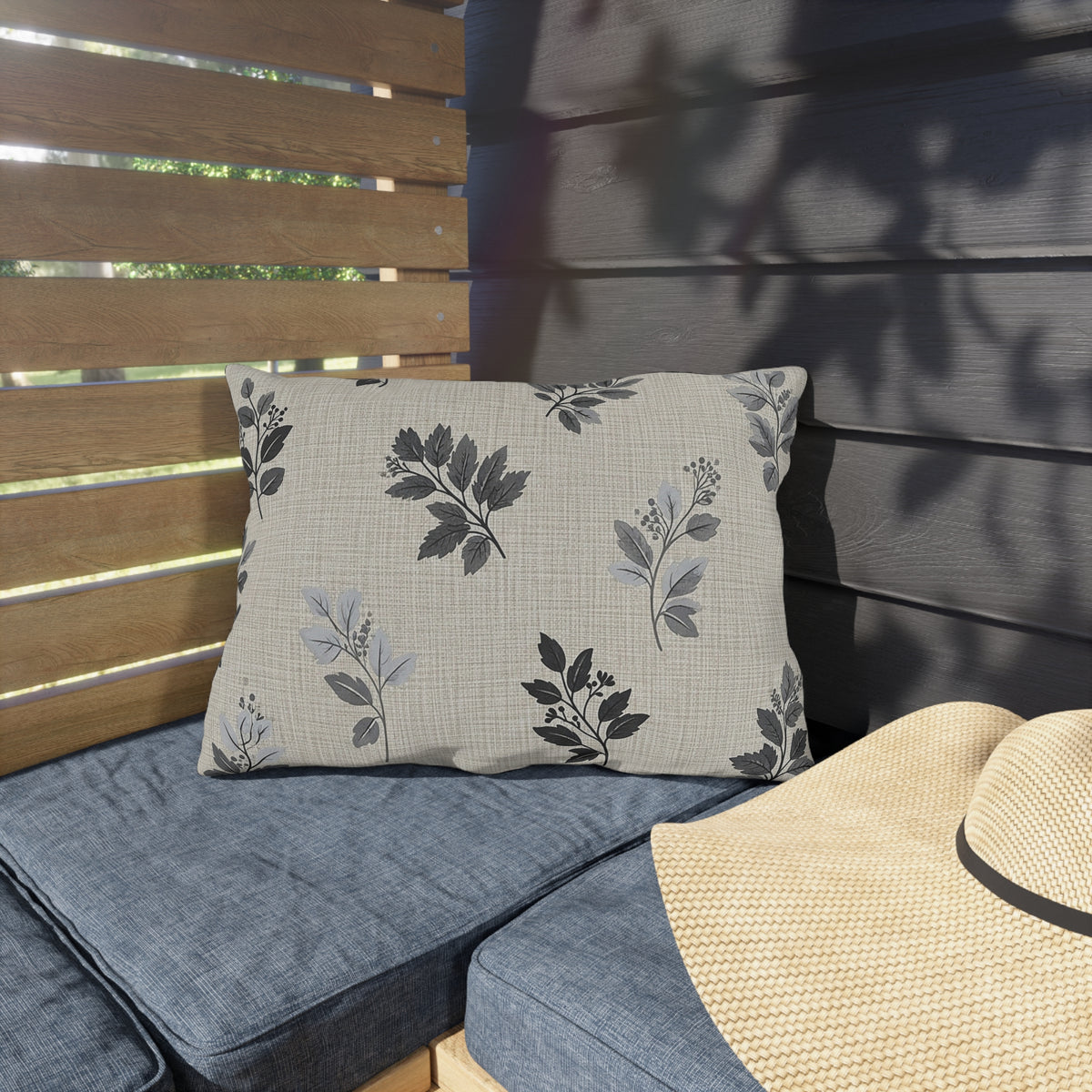 Charcoal leaf sprig lumbar outdoor pillow — spun polyester, UV and water resistant
