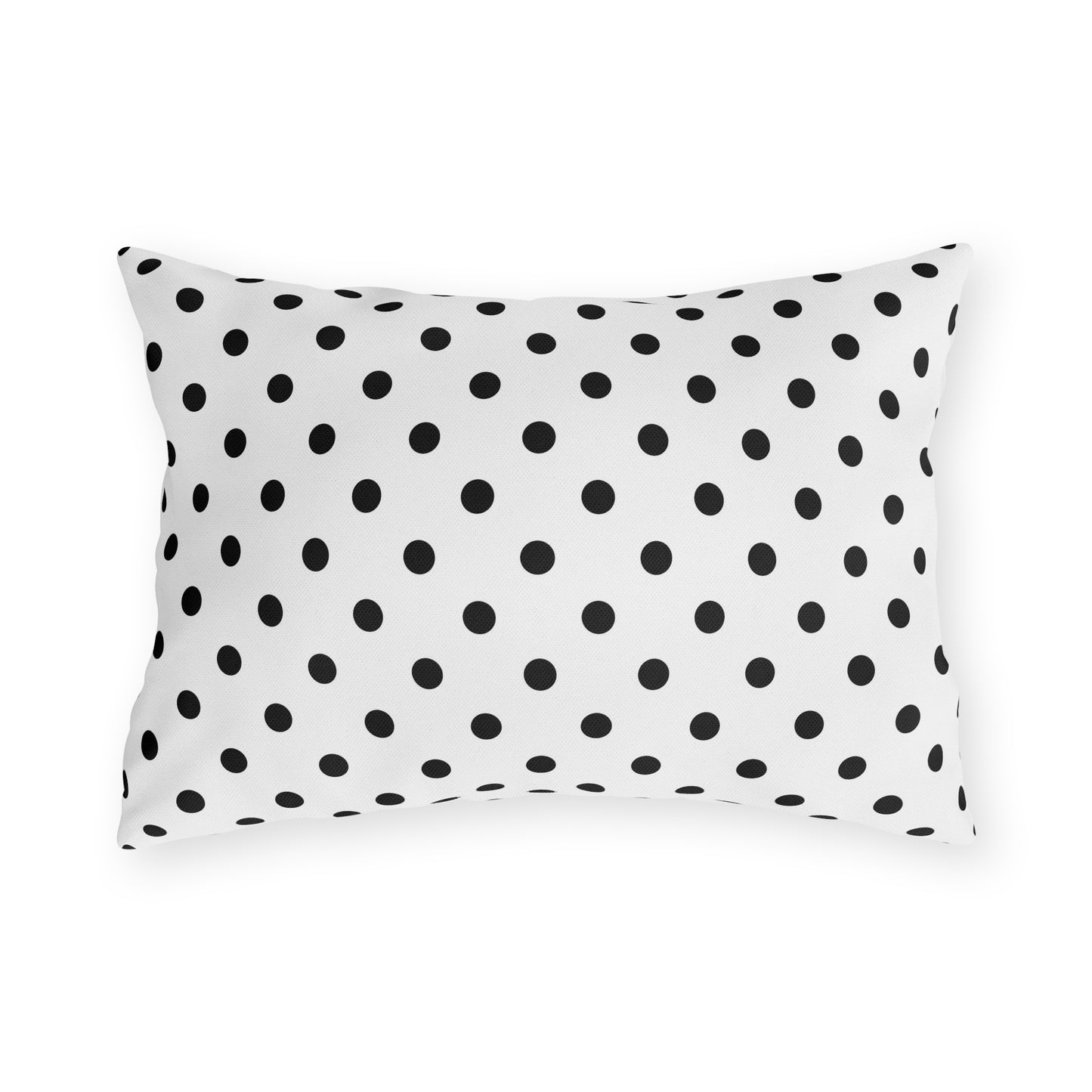Black and white polka dot outdoor pillow — spun polyester, UV and water resistant