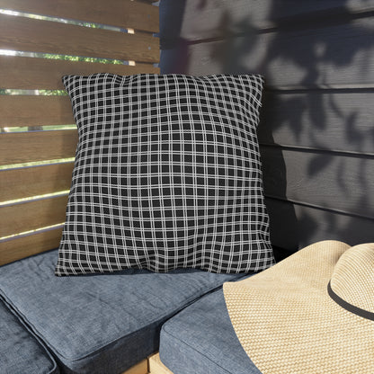 Black and white checkered outdoor pillow — spun polyester, UV and water resistant