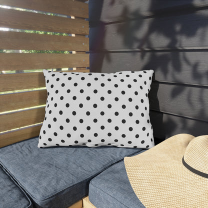 Black and white polka dot outdoor pillow — spun polyester, UV and water resistant