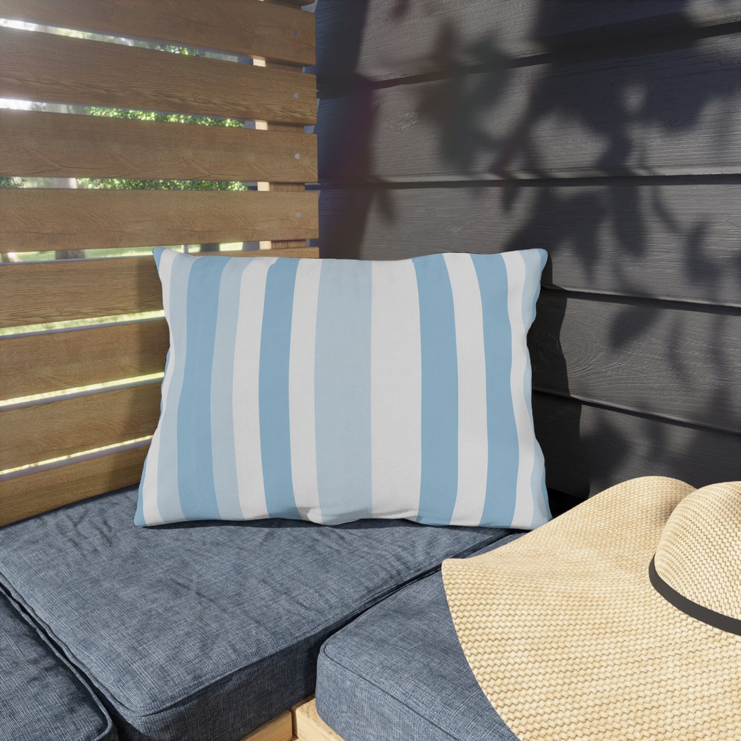 Blue and white striped outdoor pillow — spun polyester, UV and water resistant