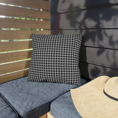 Black and white checkered outdoor pillow — spun polyester, UV and water resistant