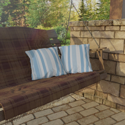 Blue and white striped outdoor pillow — spun polyester, UV and water resistant