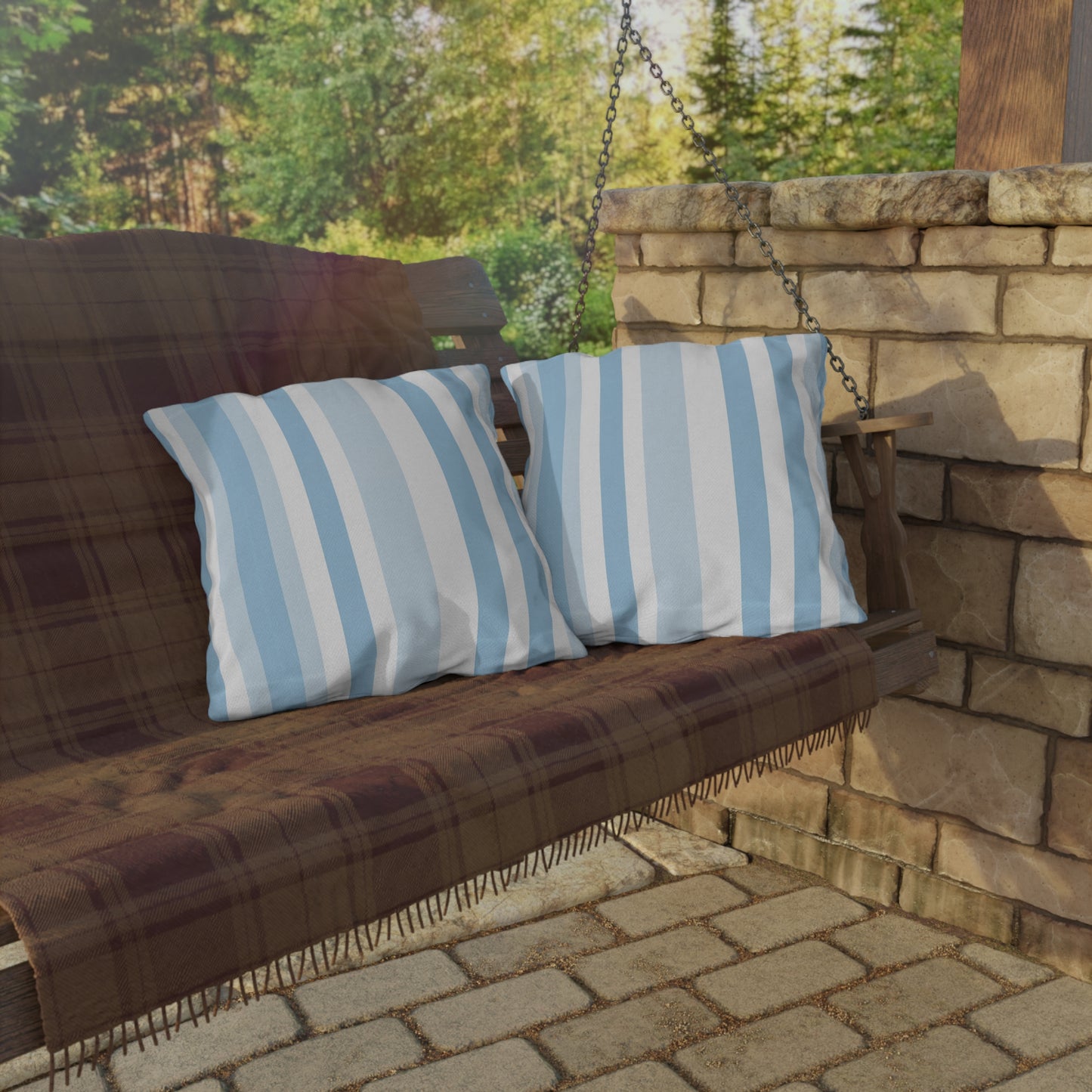 Blue and white striped outdoor pillow — spun polyester, UV and water resistant