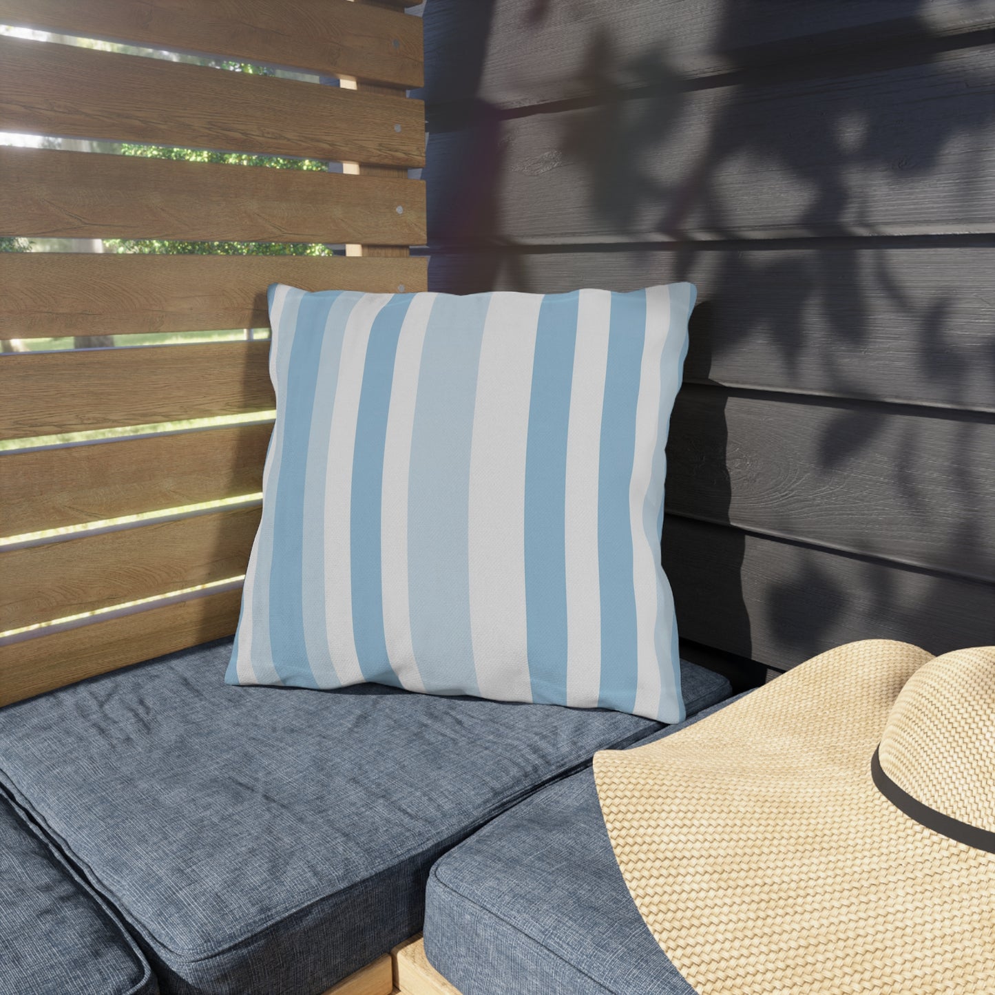 Blue and white striped outdoor pillow — spun polyester, UV and water resistant