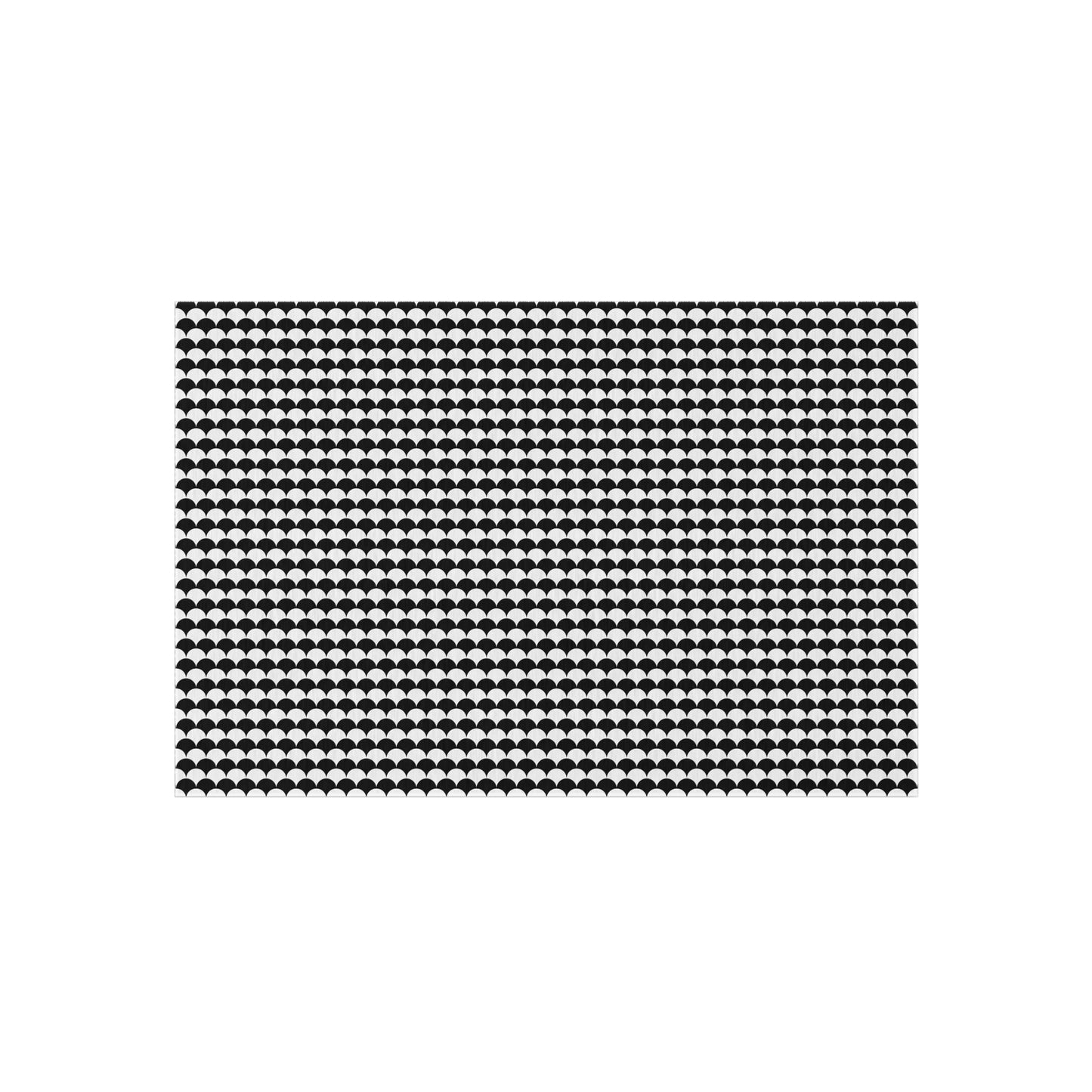 Black and white scallop outdoor rug — soft polyester chenille with a non-slip backing