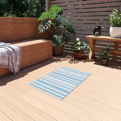 Blue and white striped outdoor rug — soft polyester chenille with a non-slip backing