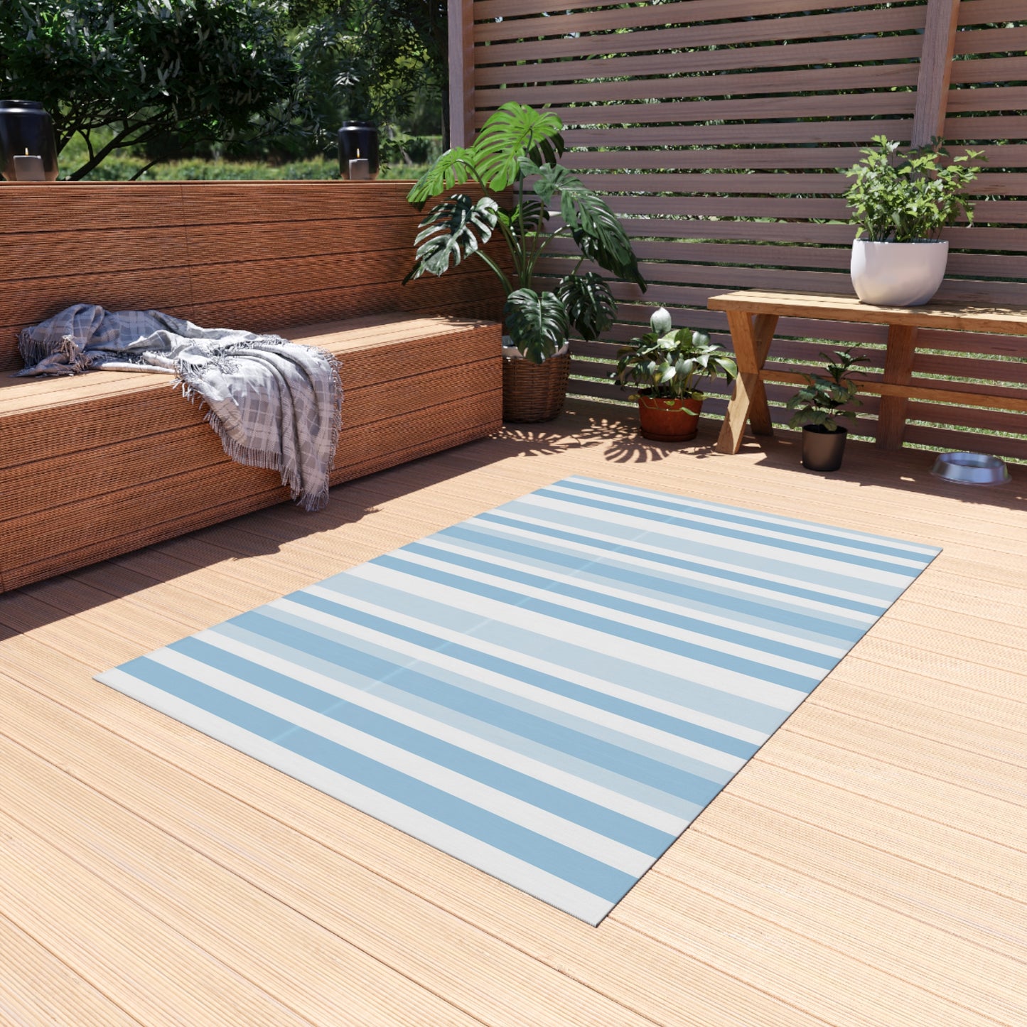 Blue and white striped outdoor rug — soft polyester chenille with a non-slip backing