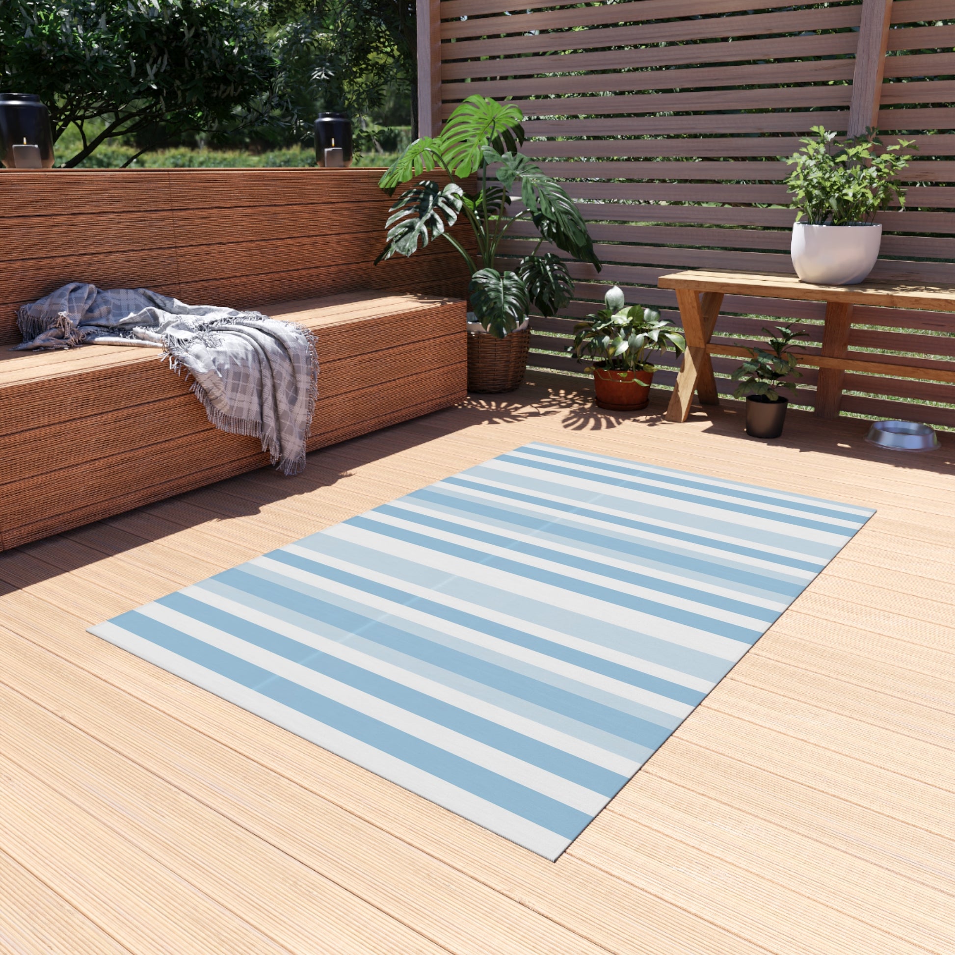 Blue and white striped outdoor rug — soft polyester chenille with a non-slip backing