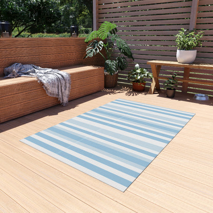 Blue and white striped outdoor rug — soft polyester chenille with a non-slip backing