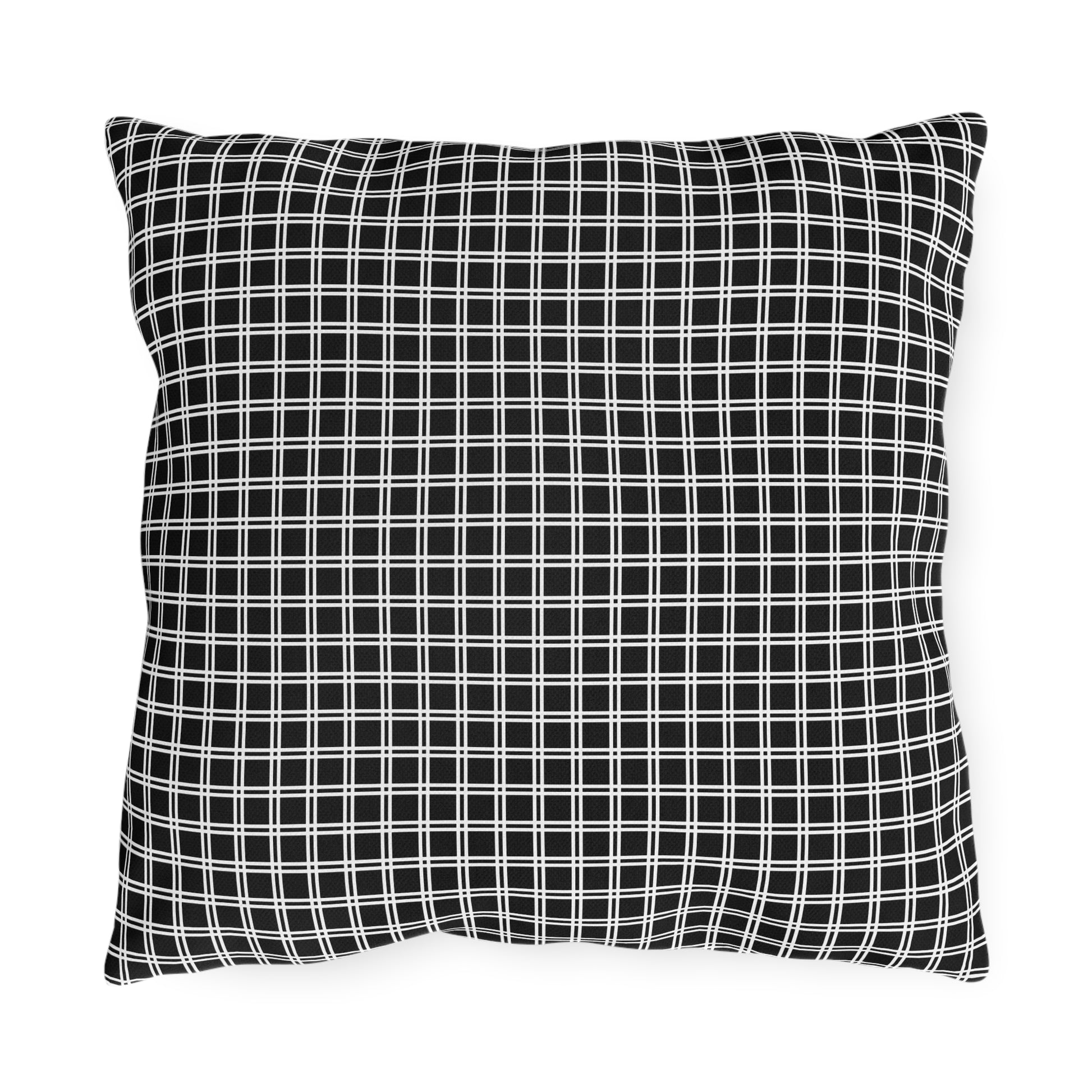 Black and white checkered outdoor pillow — spun polyester, UV and water resistant