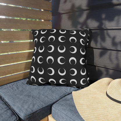 Black crescent moon outdoor pillow — spun polyester, UV and water resistant