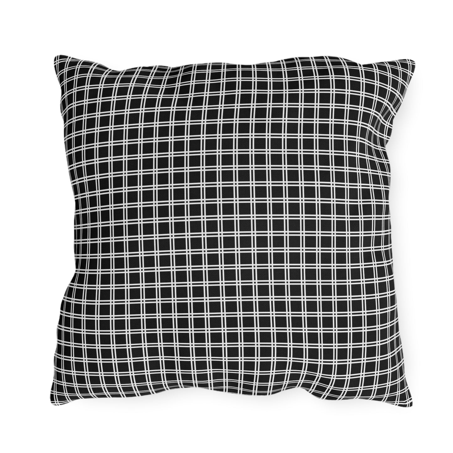 Black and white checkered outdoor pillow — spun polyester, UV and water resistant