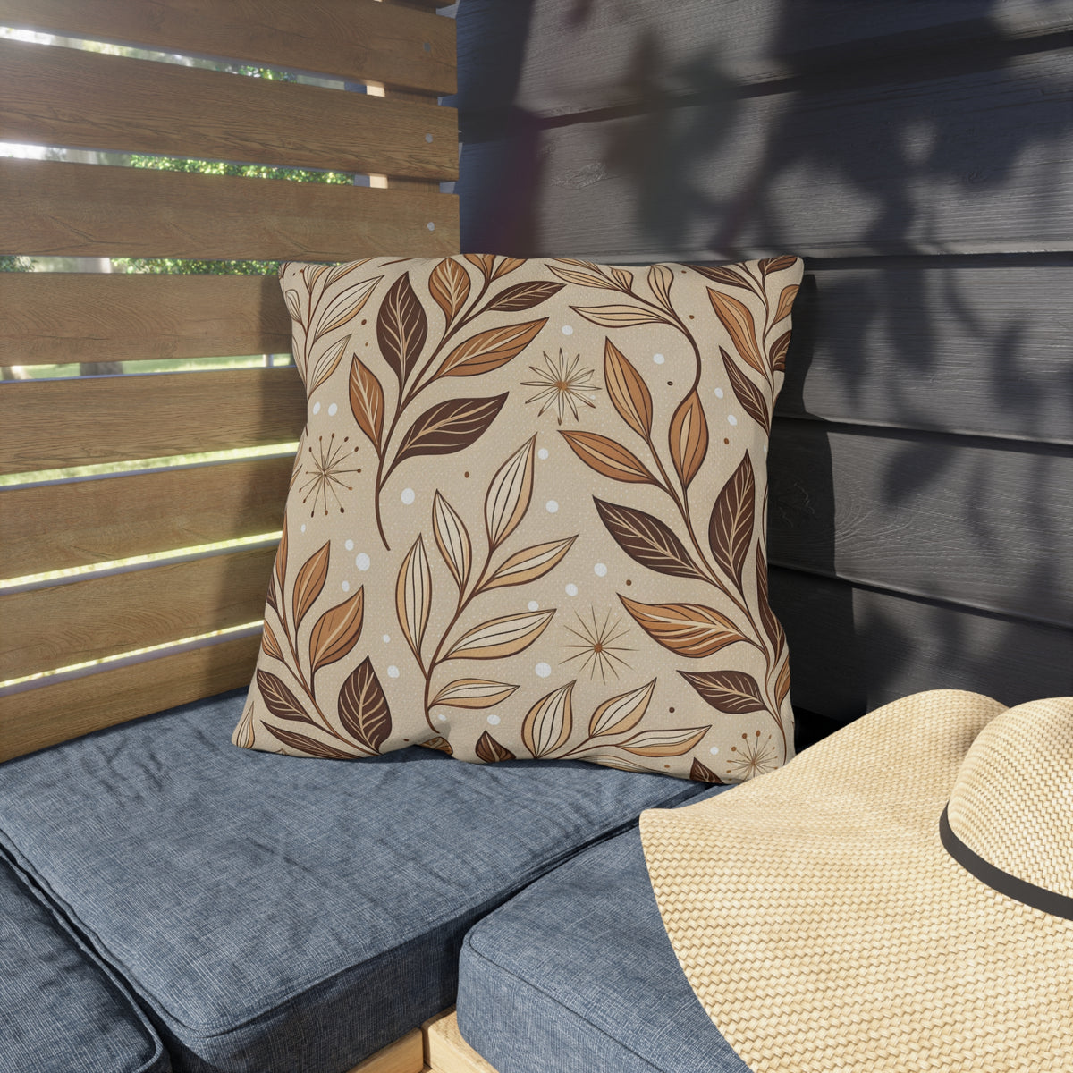 Brown leaf sprig outdoor pillow — spun polyester, UV and water resistant