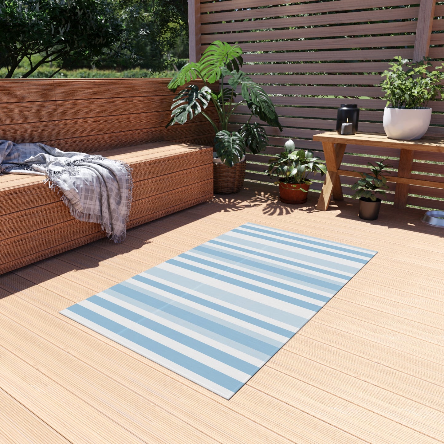 Blue and white striped outdoor rug — soft polyester chenille with a non-slip backing