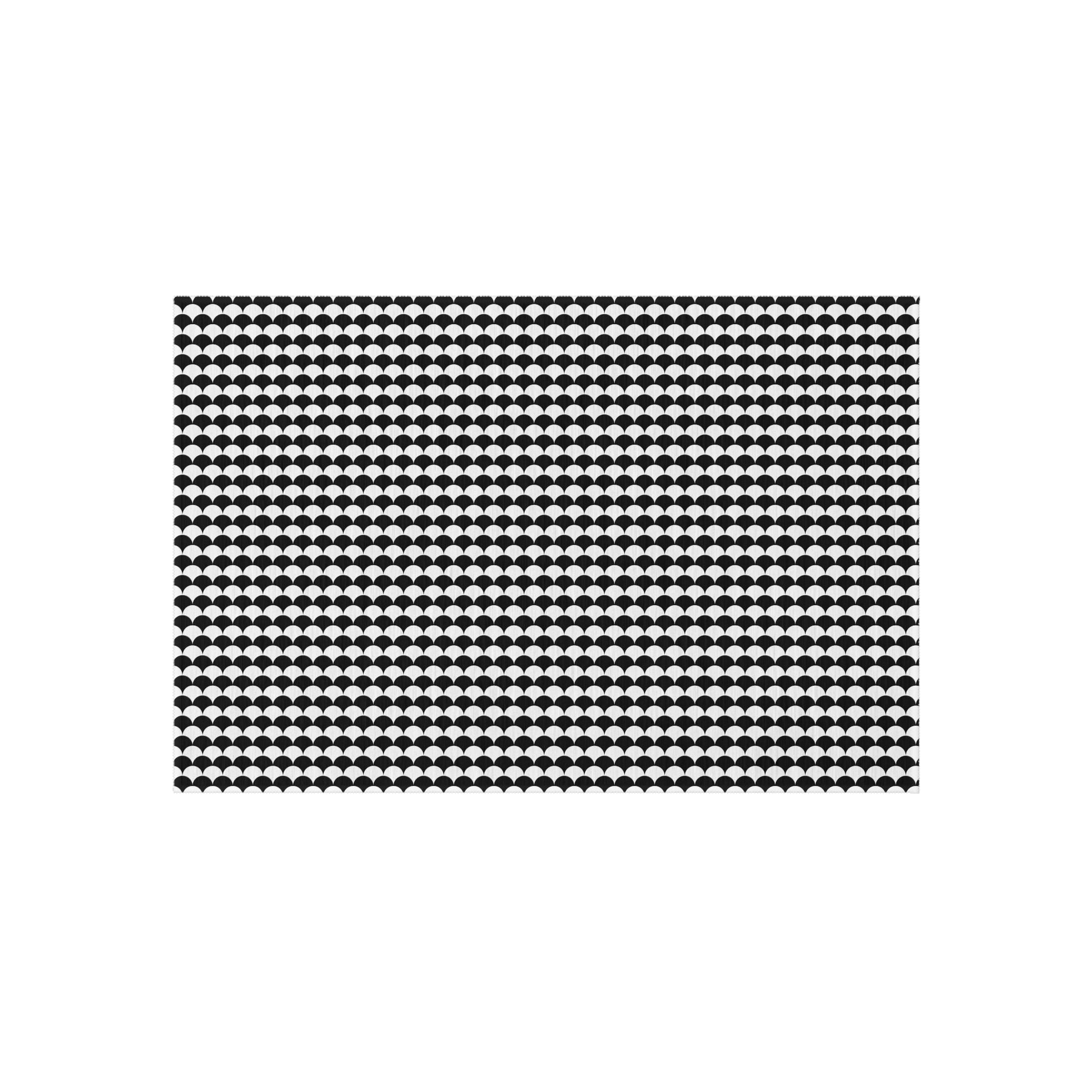 Black and white scallop outdoor rug — soft polyester chenille with a non-slip backing