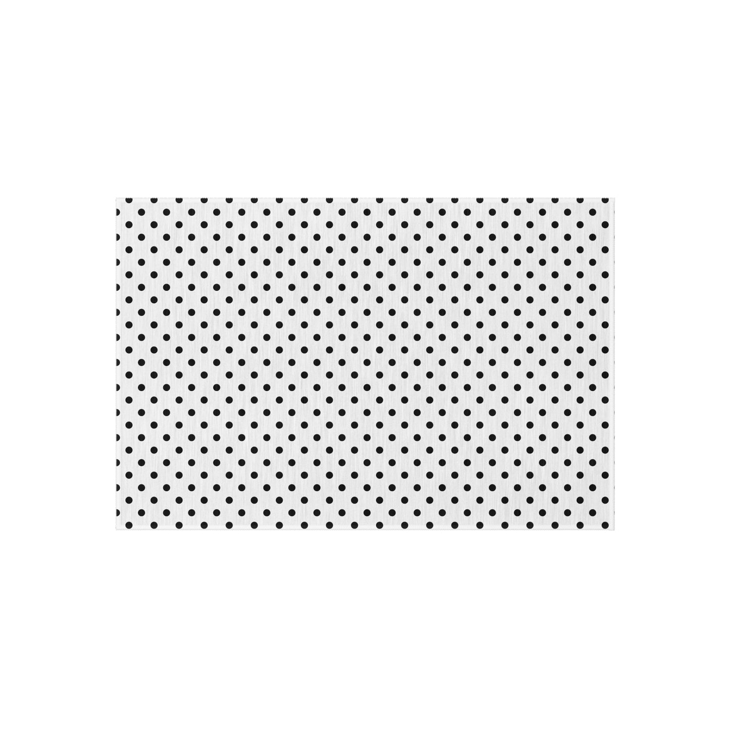 Black and white polka dot outdoor rug — soft polyester chenille with a non-slip backing