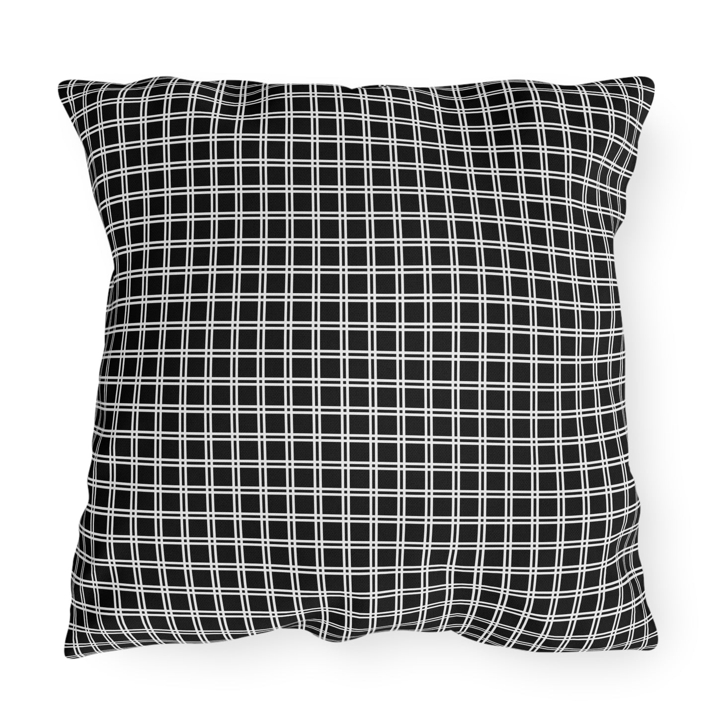 Black and white checkered outdoor pillow — spun polyester, UV and water resistant