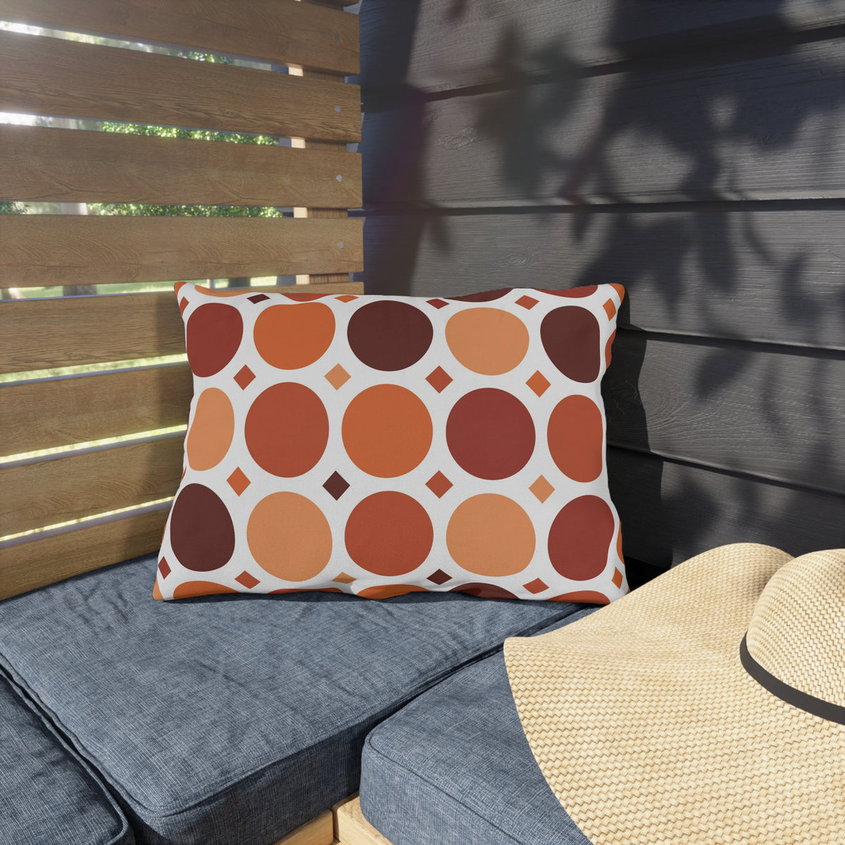 Terracotta dot grid lumbar outdoor pillow — spun polyester, UV and water resistant
