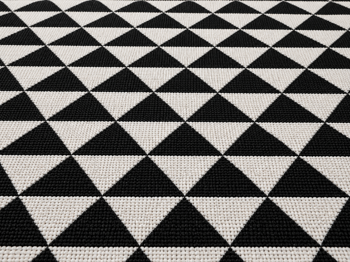 Black and white quilt triangle outdoor rug — soft polyester chenille with a non-slip backing