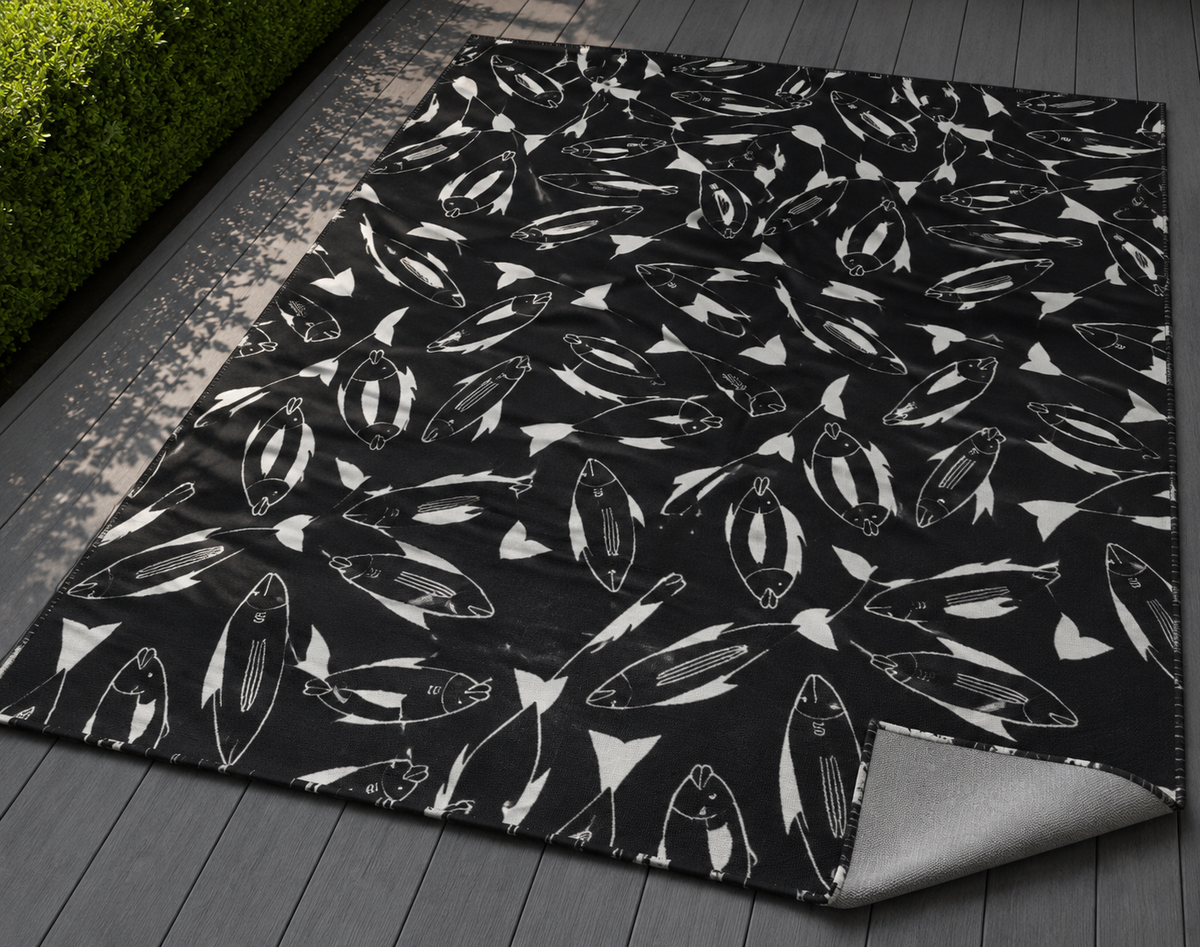 Black and white fish outdoor rug — soft polyester chenille with a non-slip backing