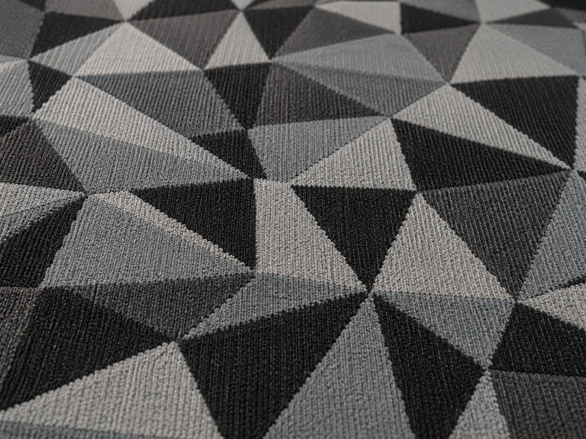 Charcoal facet outdoor rug — soft polyester chenille with a non-slip backing