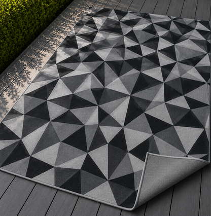 Charcoal facet outdoor rug — soft polyester chenille with a non-slip backing
