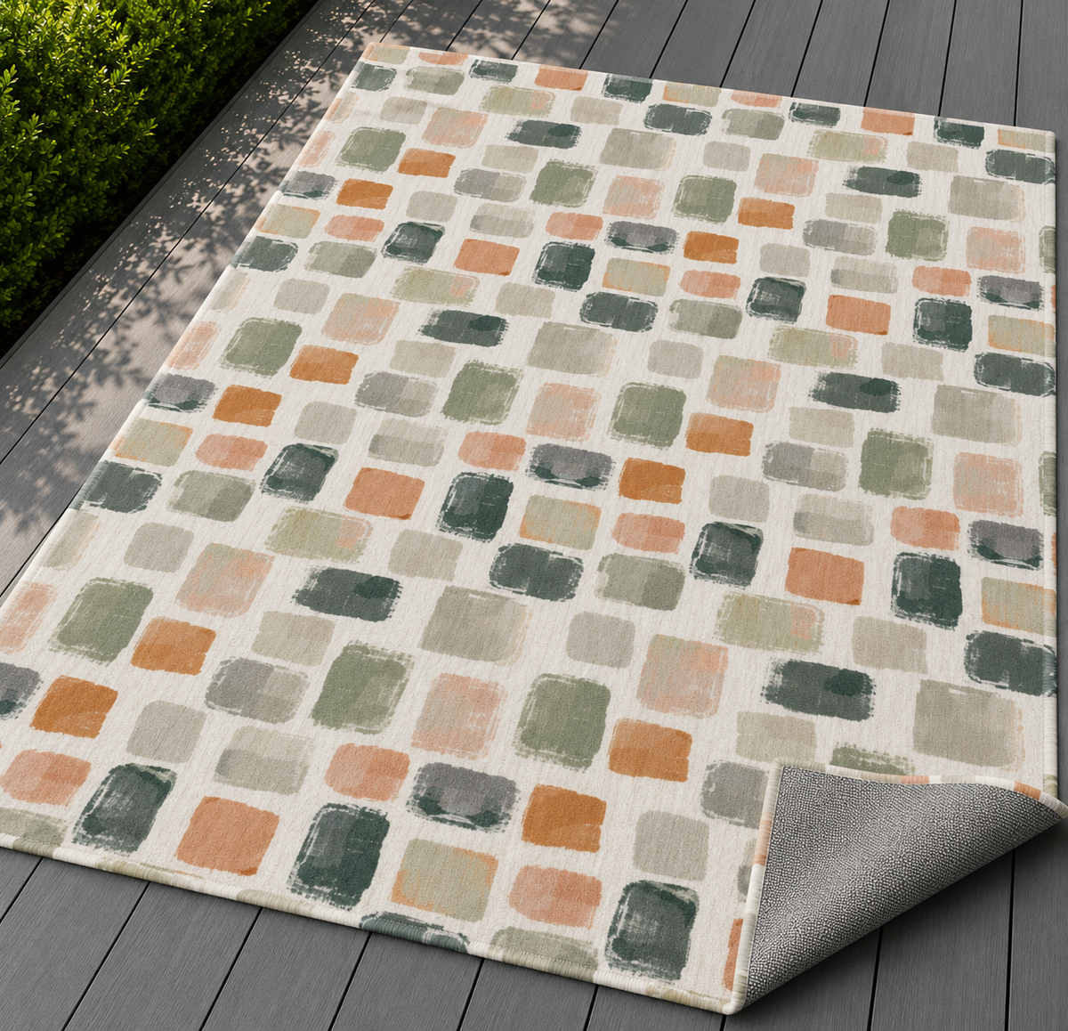 Painted tile outdoor rug in sage, terracotta and grey — soft polyester chenille with a non-slip backing