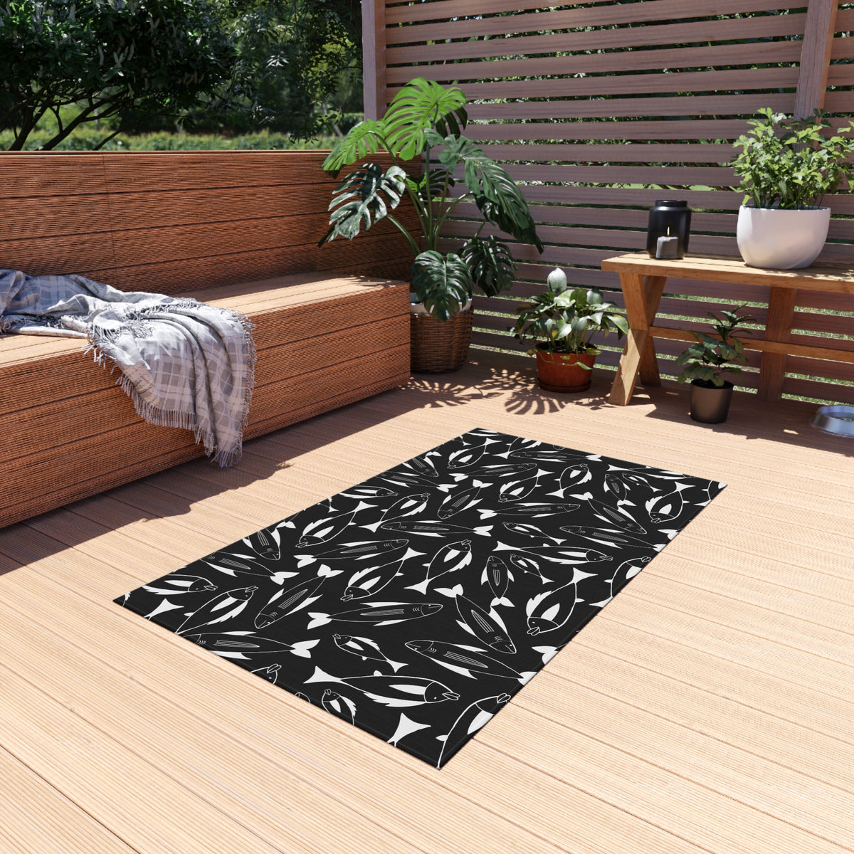 Black and white fish outdoor rug — soft polyester chenille with a non-slip backing