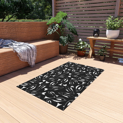 Black and white fish outdoor rug — soft polyester chenille with a non-slip backing