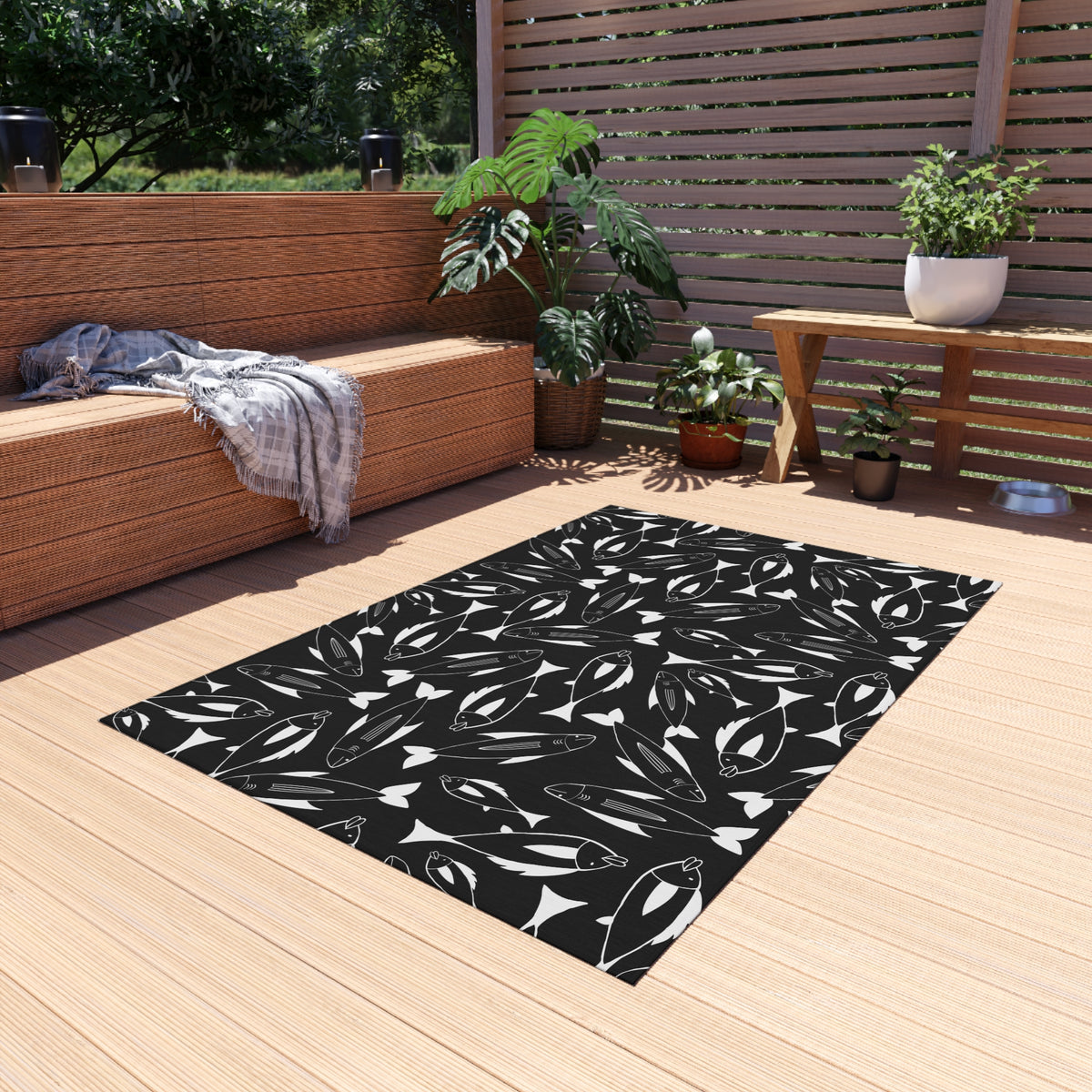 Black and white fish outdoor rug — soft polyester chenille with a non-slip backing