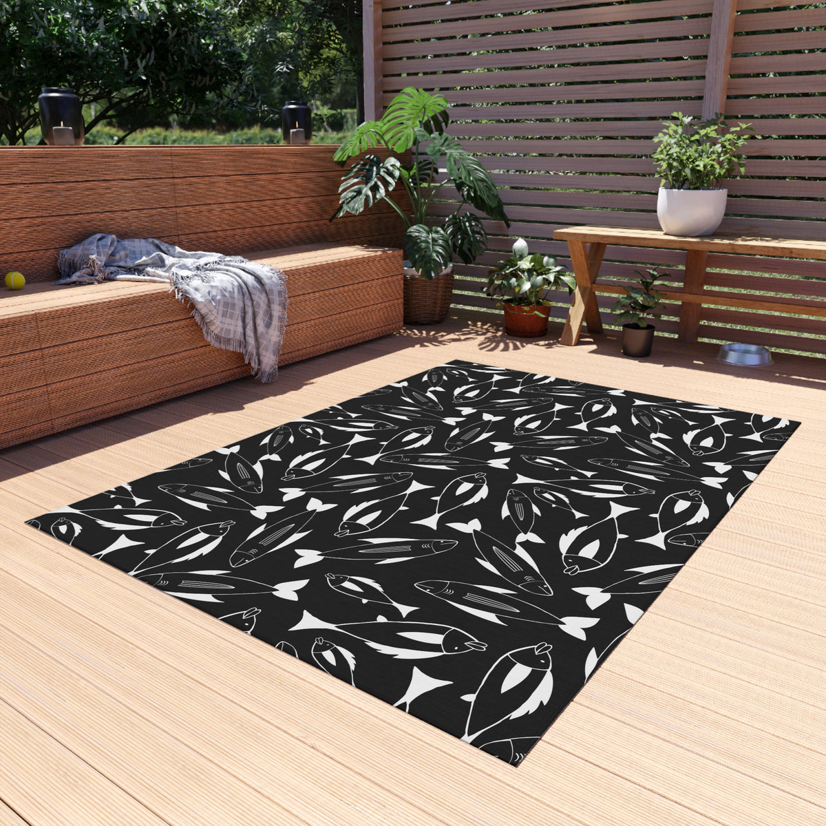 Black and white fish outdoor rug — soft polyester chenille with a non-slip backing