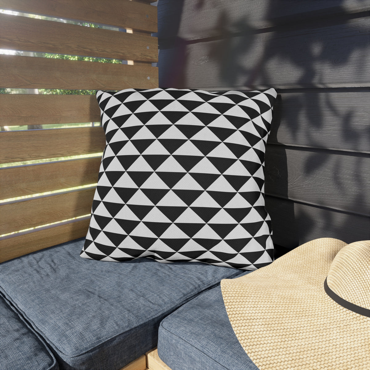 Black and white quilt triangle outdoor pillow — spun polyester, UV and water resistant